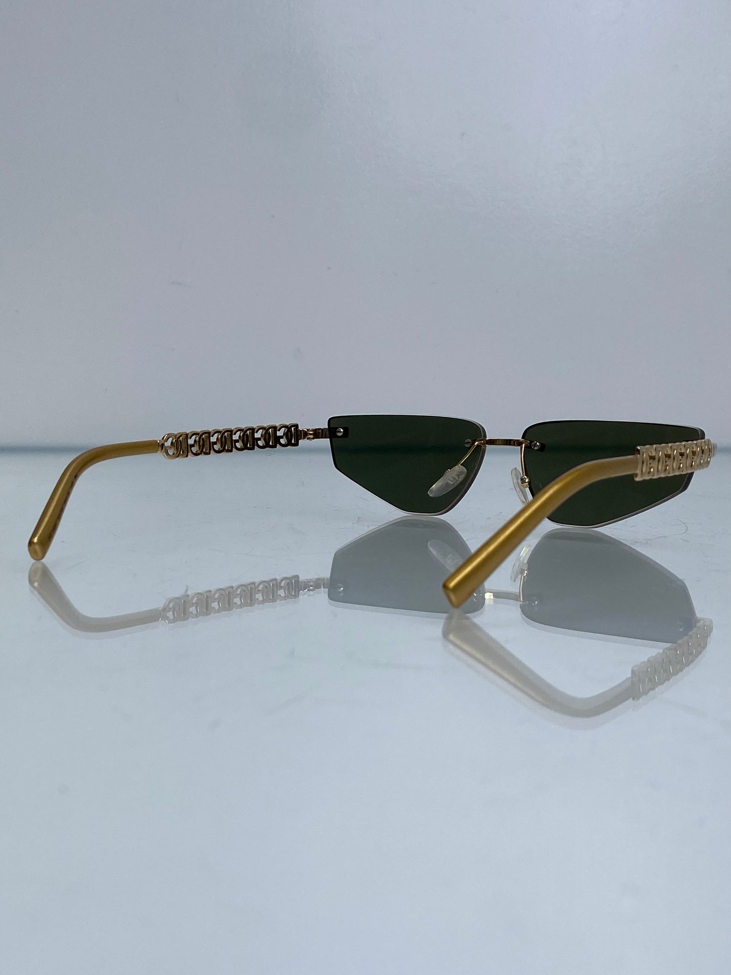 Dolce & Gabbana Gold Logo Frameless Sunglasses