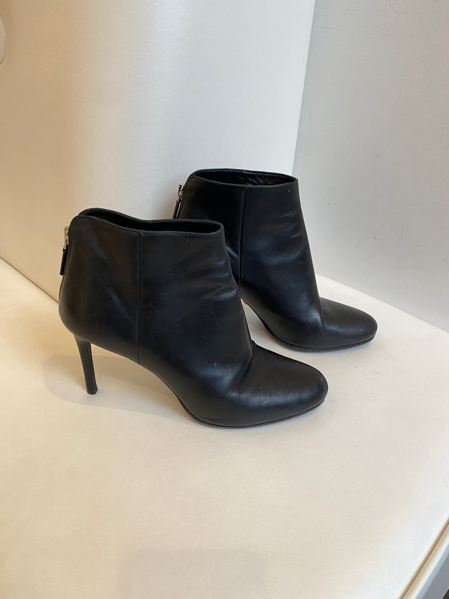 Prada black leather booties