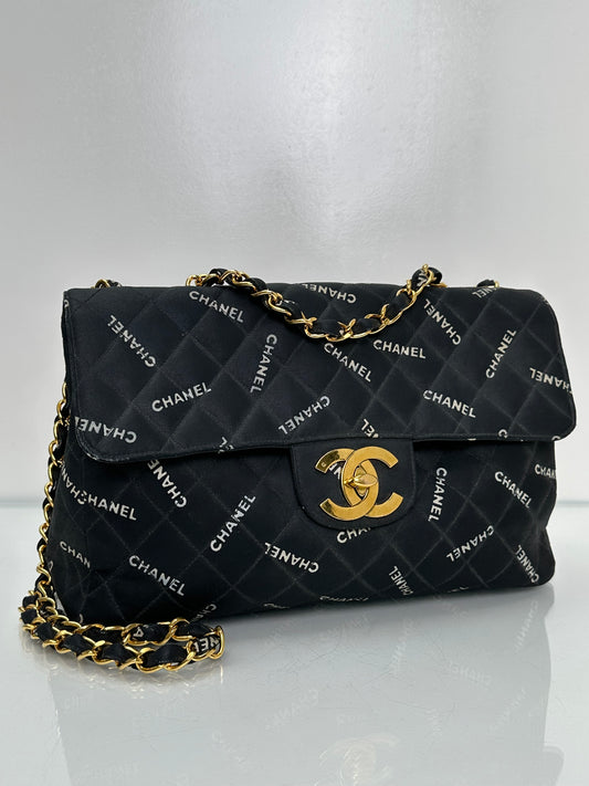 Chanel 1995 Black Canvas “Chanel” Single Flap Maxi Bag 24KGHW
