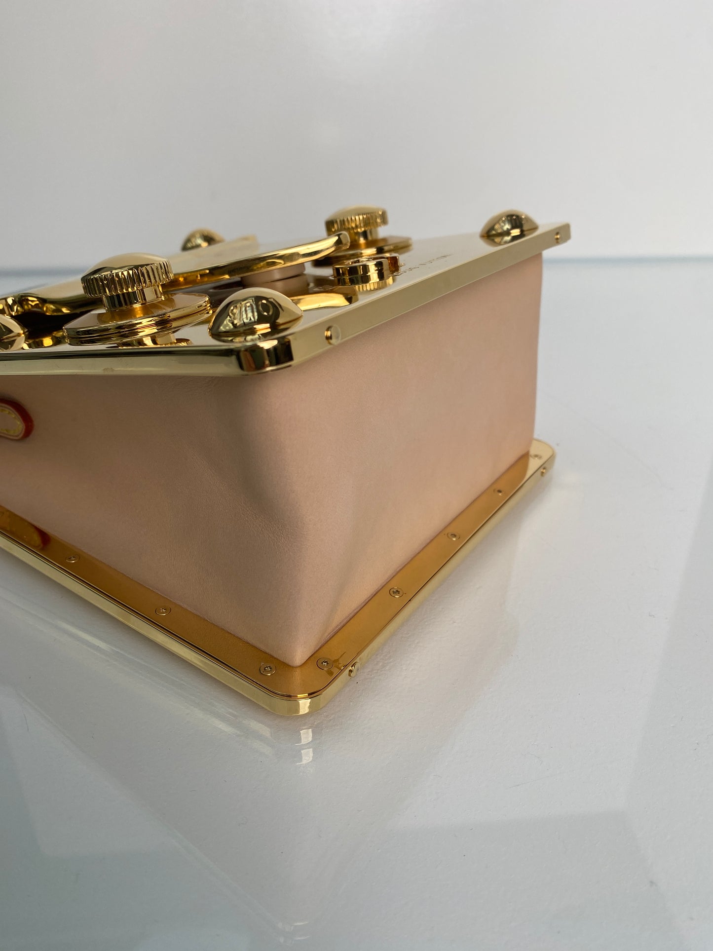 Louis Vuitton Gold Metal & Leather Fastener Bag