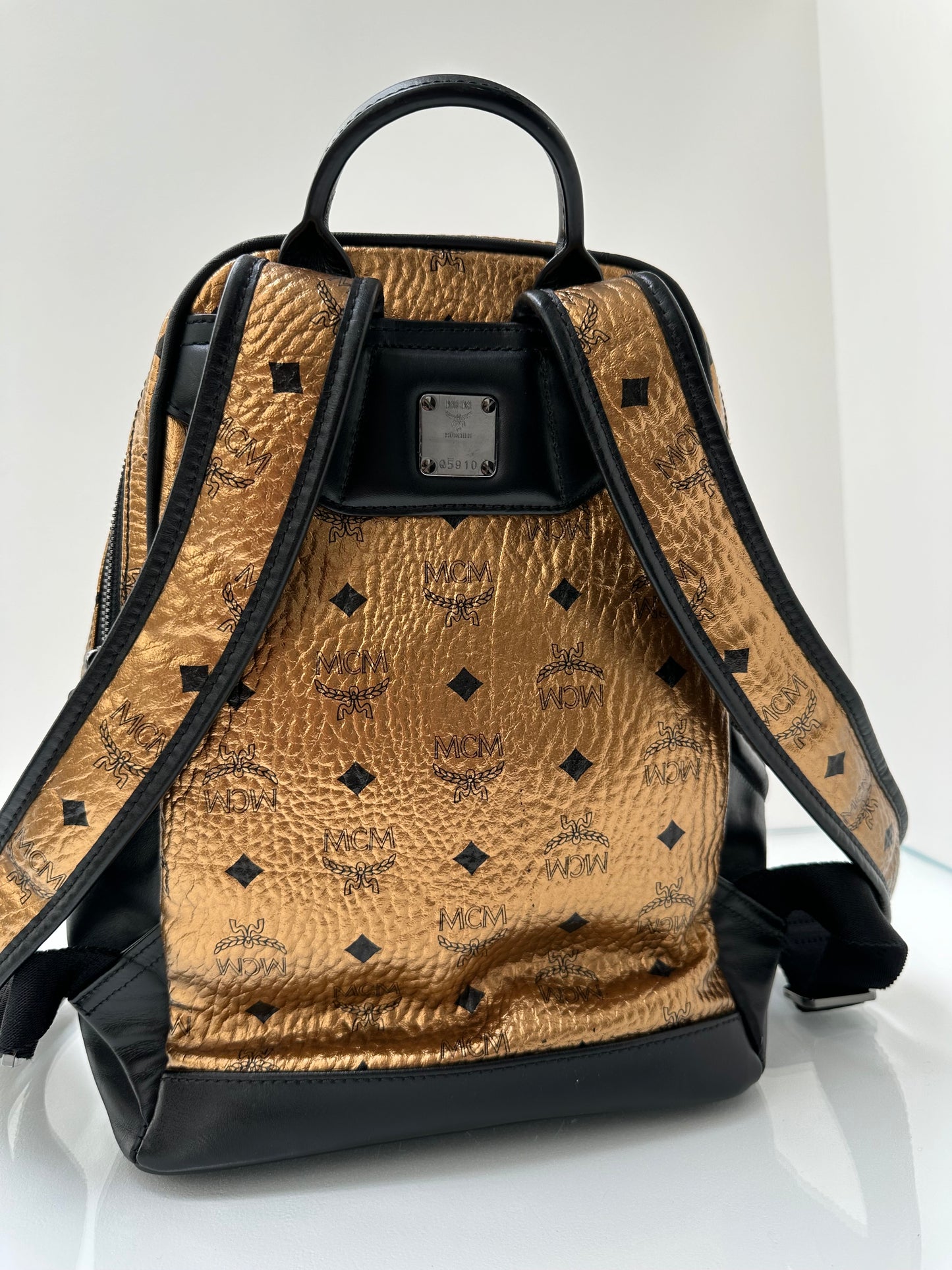 MCM Gold and Black Backpack