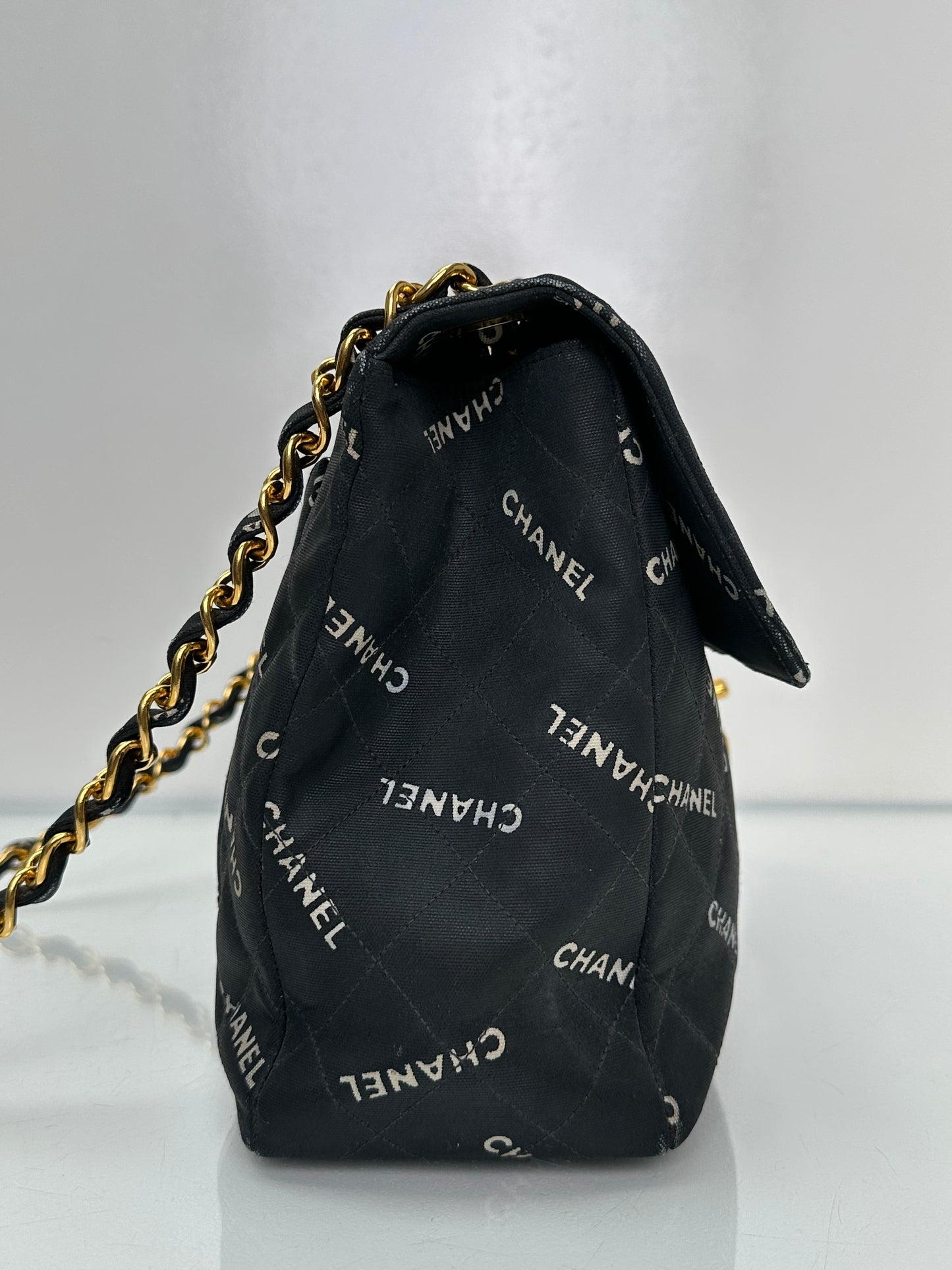 Chanel 1995 Black Canvas “Chanel” Single Flap Maxi Bag 24KGHW