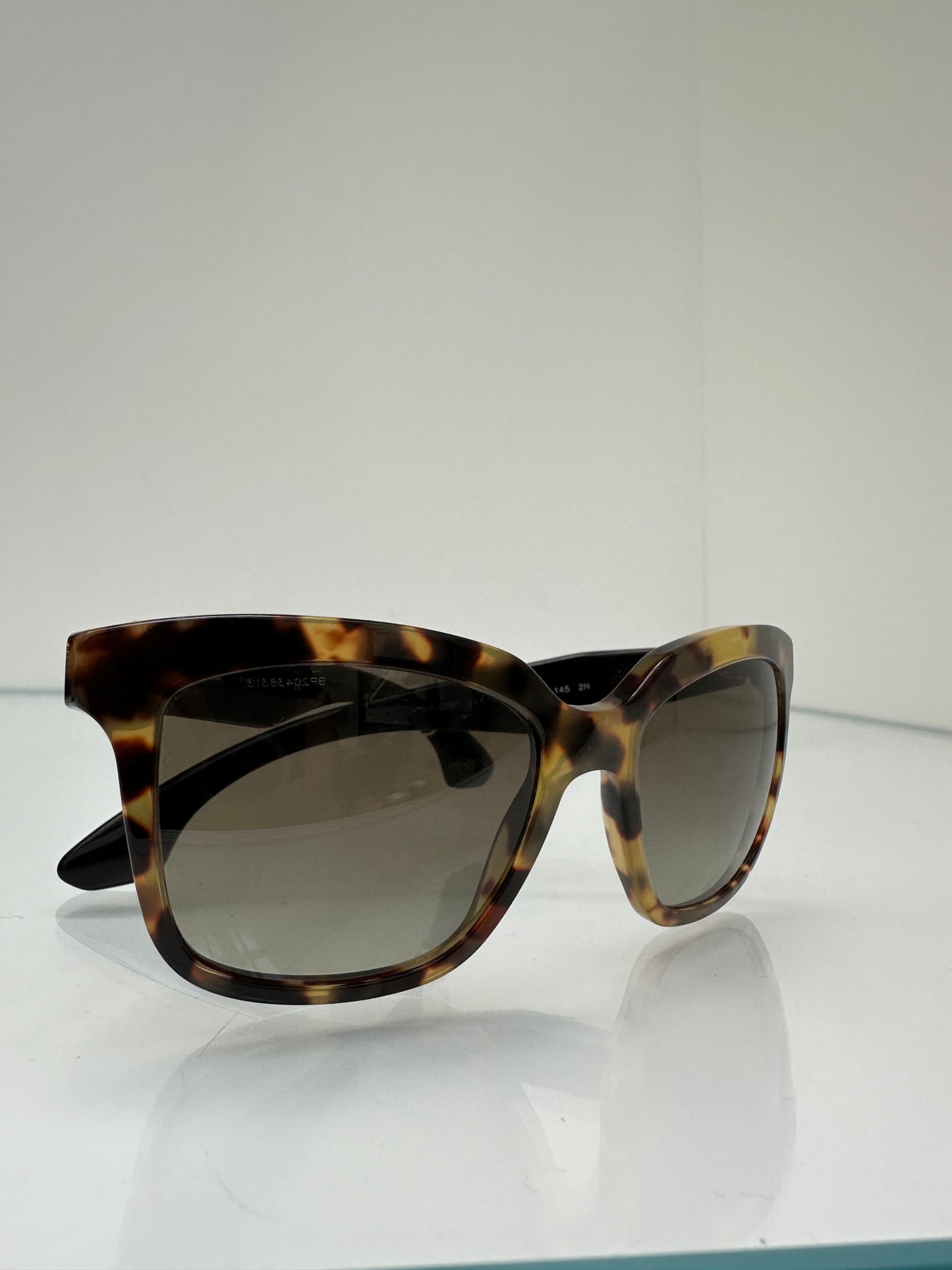 Miu Miu Tortoise Studded Sunglasses