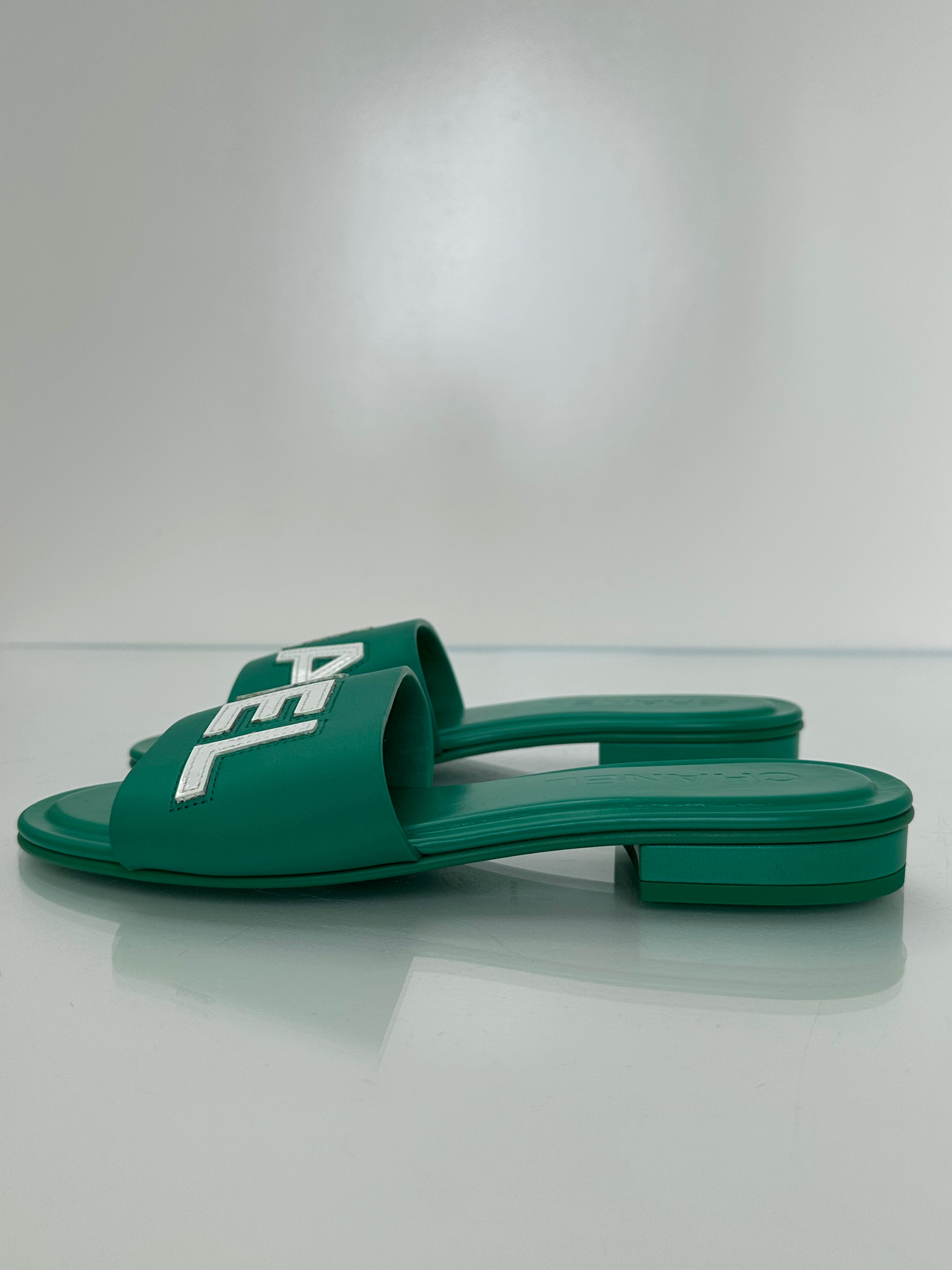 Chanel Emerald Green “CHA-NEL” Sandals, 37
