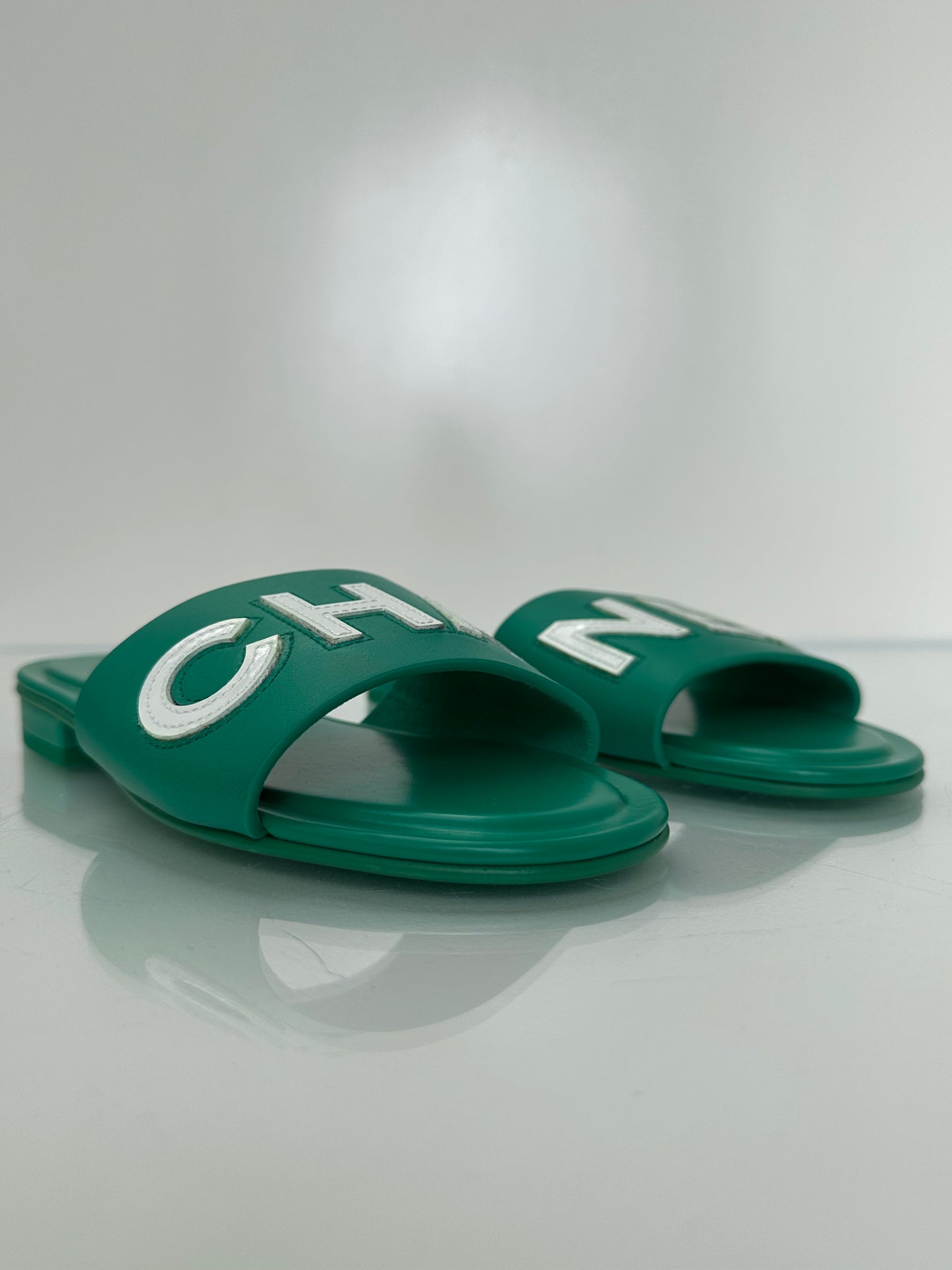 Chanel Emerald Green “CHA-NEL” Sandals, 37