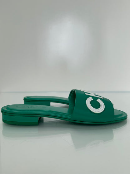 Chanel Emerald Green “CHA-NEL” Sandals, 37