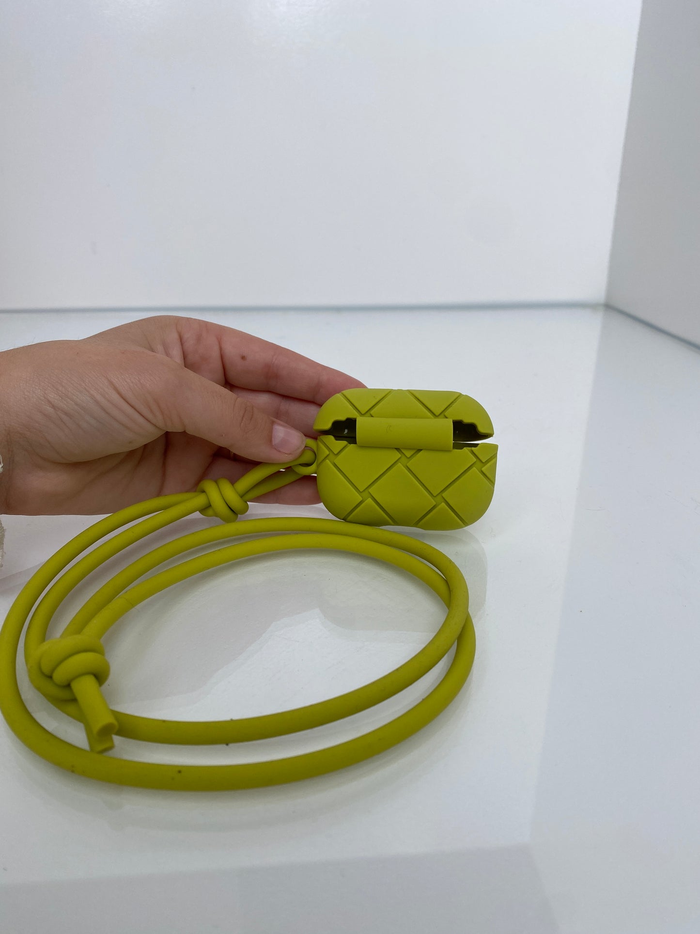 Bottega Veneta Green Rubber Woven AirPods Case