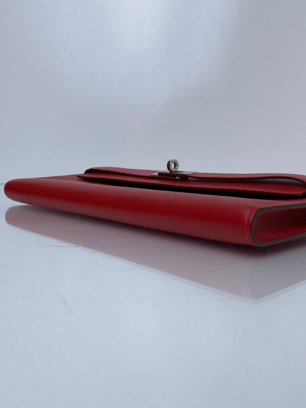 Hermes Kelly Cut Pochette Rouge Casaque Swift PHW #M
