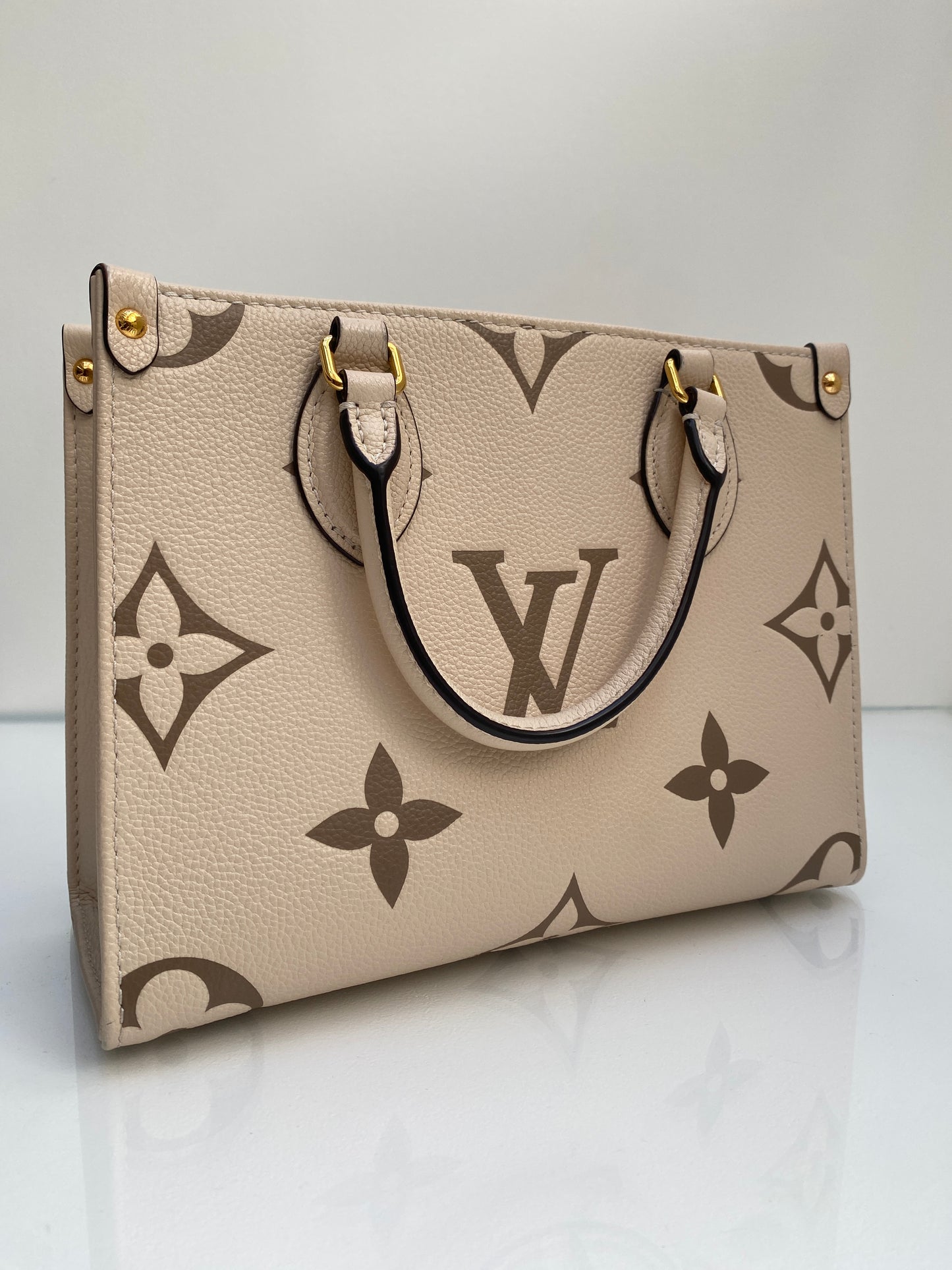 Louis Vuitton Cream On The Go PM Bag