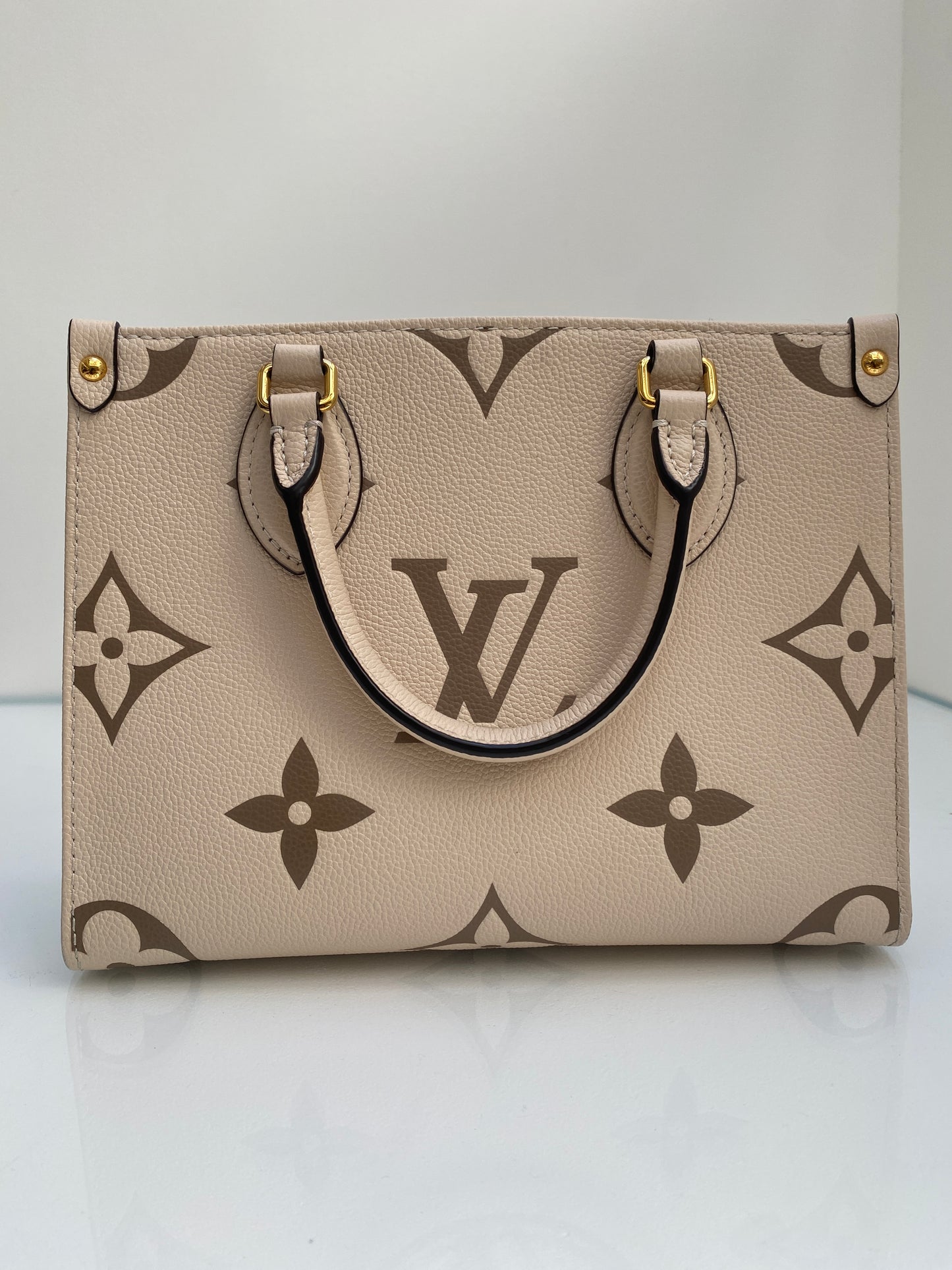 Louis Vuitton Cream On The Go PM Bag