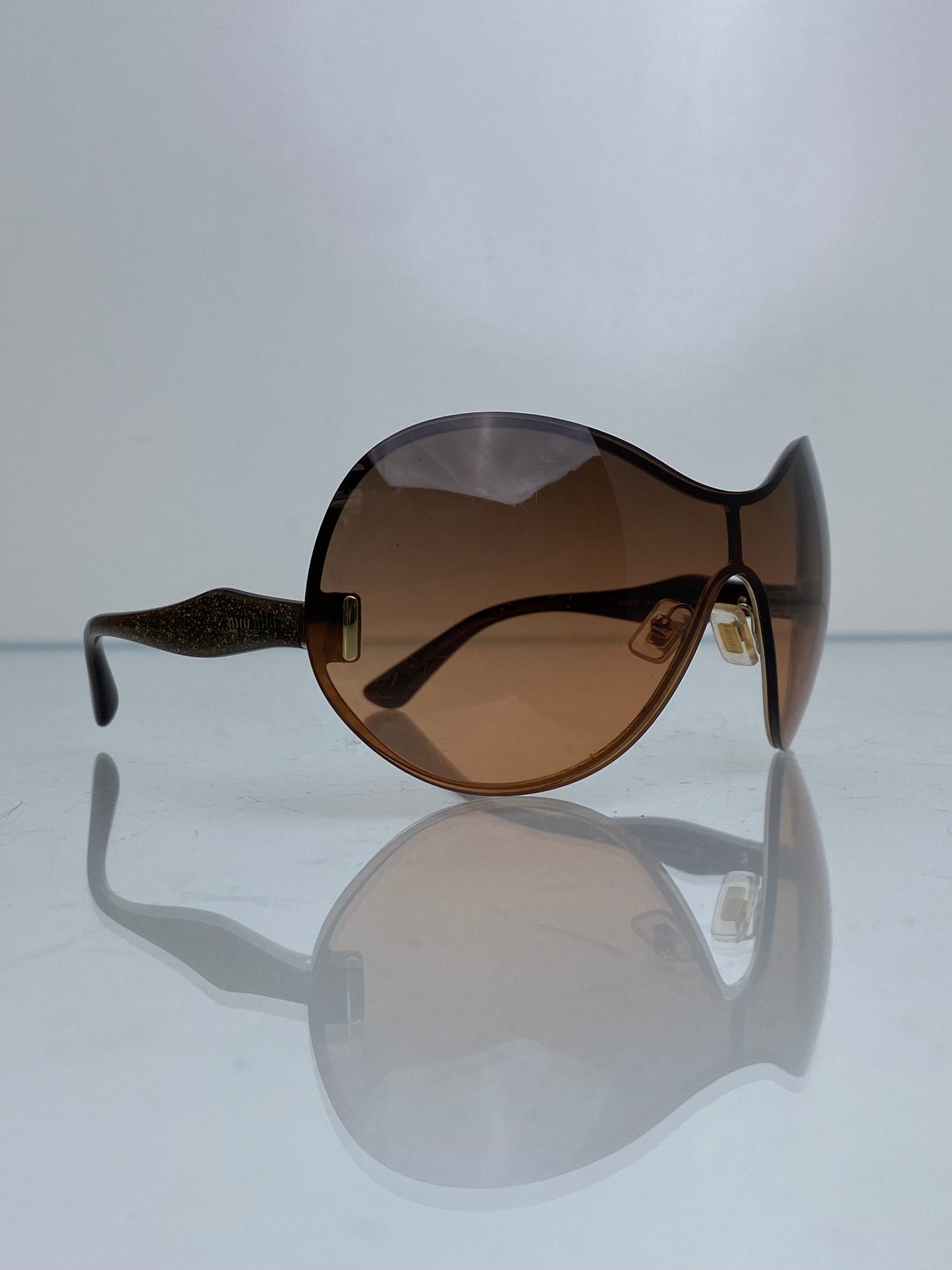 Miu Miu Gold Oversized Shield Sunglasses