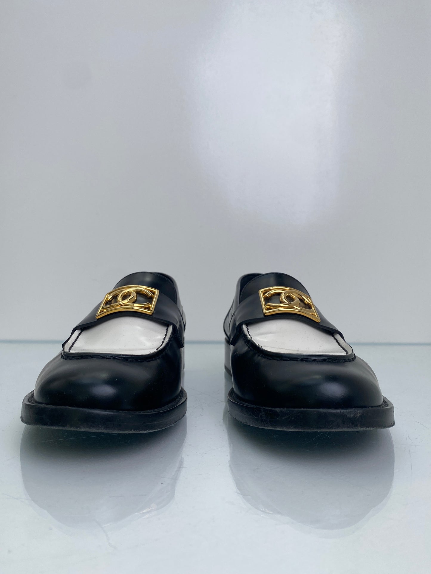 Chanel Black, White, & Gold CC Leather Loafers, 42