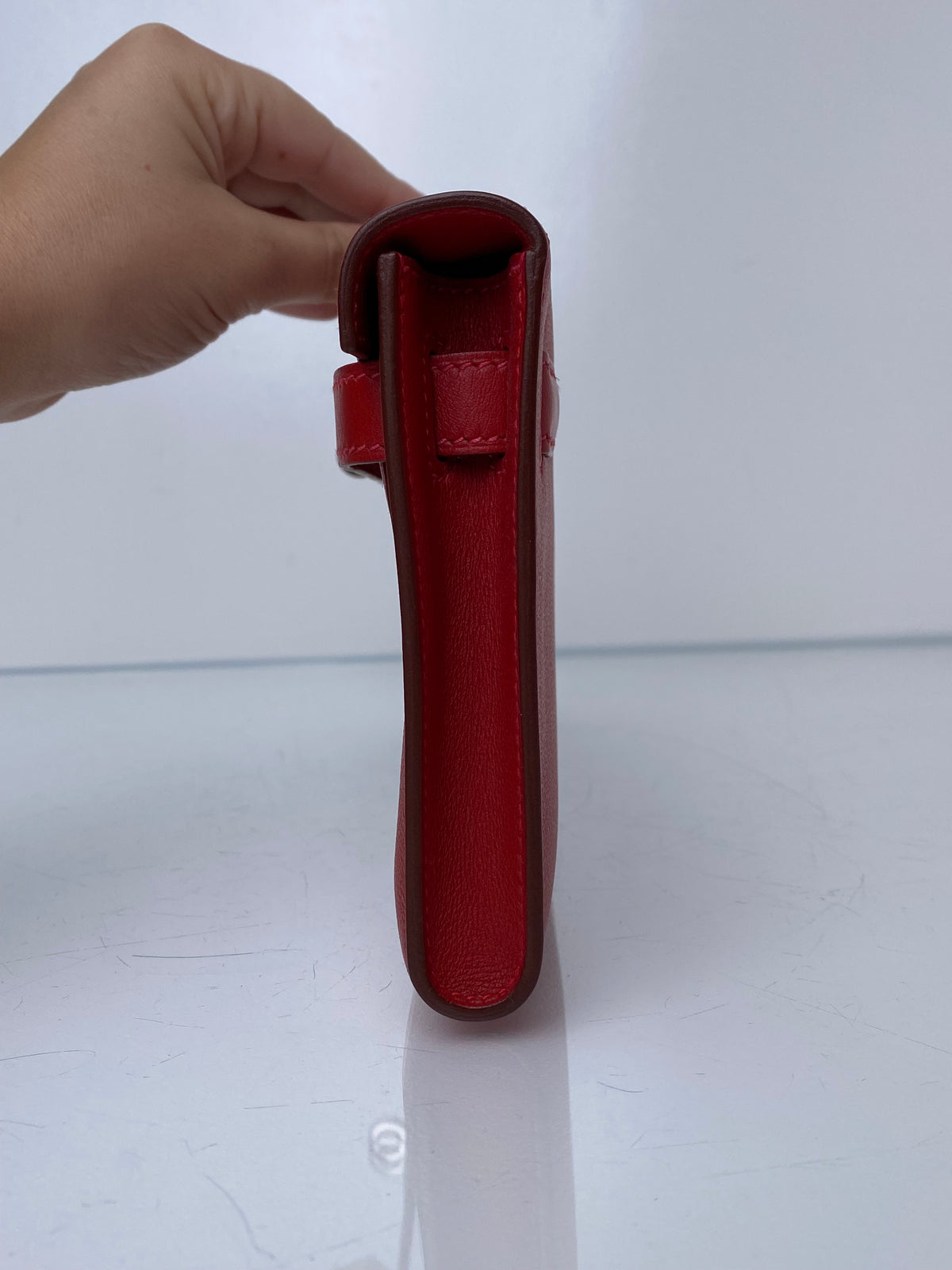 Hermes Kelly Cut Pochette Rouge Casaque Swift PHW #M
