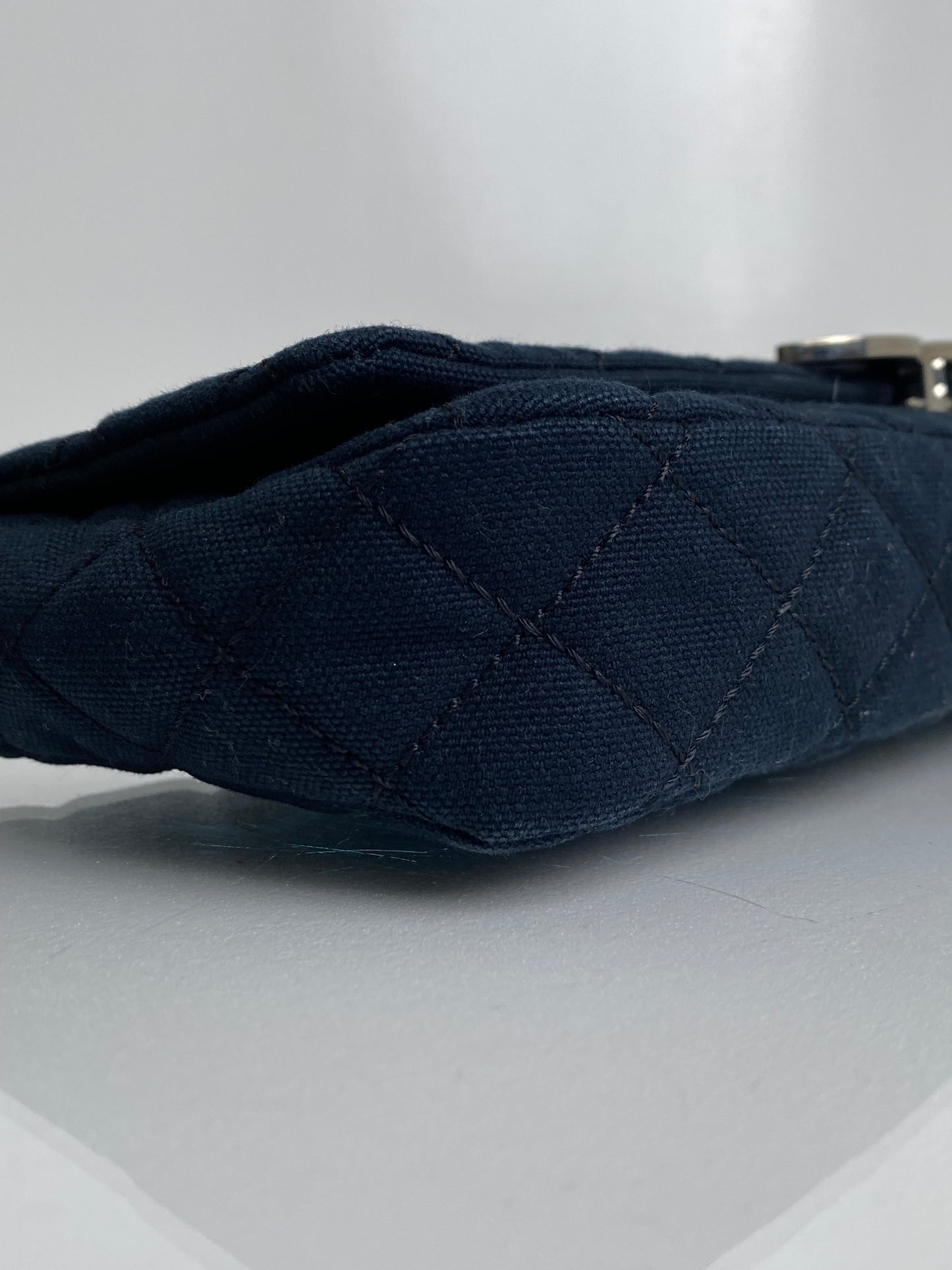 Chanel Cruise Black Canvas Quilted Clutch SHW