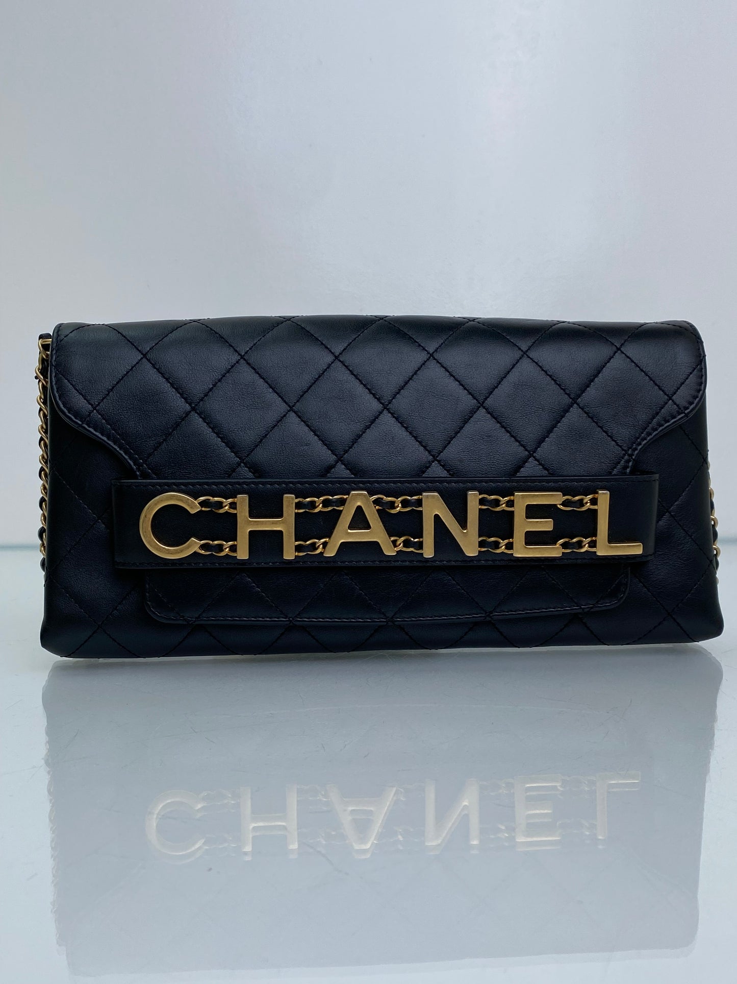 Chanel Black Logo Enchained Flap Quilted Calfskin Clutch GHW