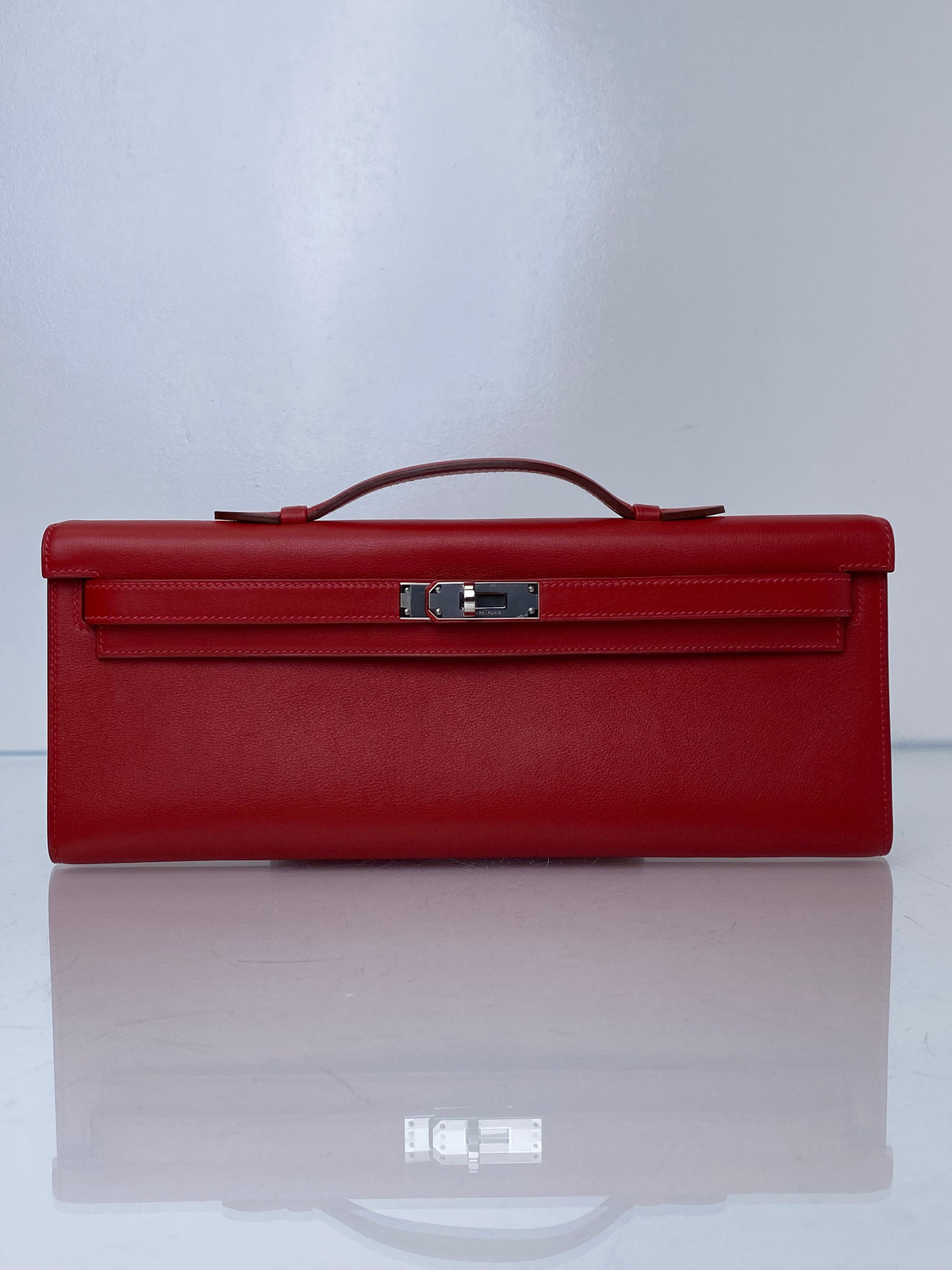 Hermes Kelly Cut Pochette Rouge Casaque Swift PHW #M