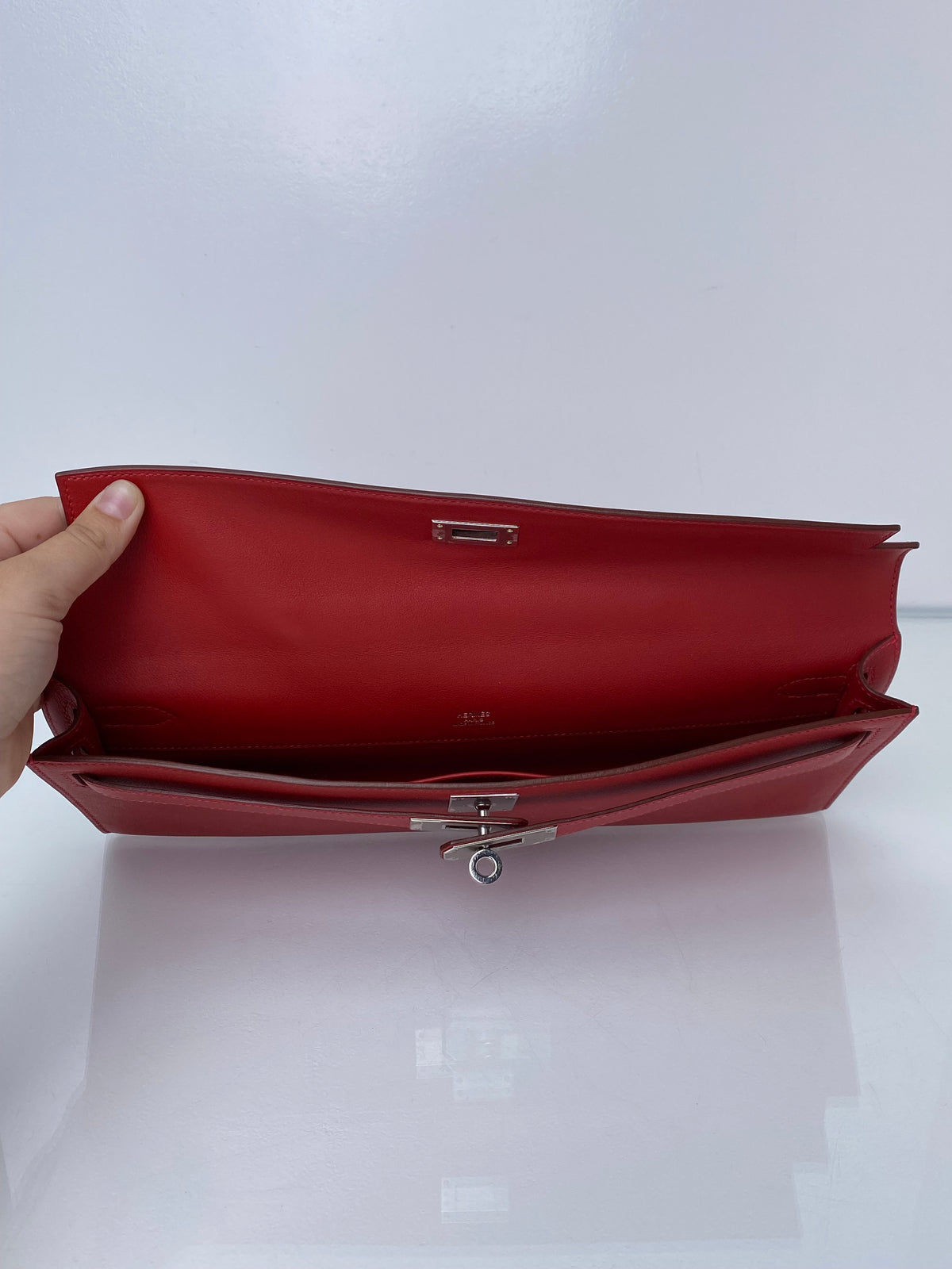 Hermes Kelly Cut Pochette Rouge Casaque Swift PHW #M