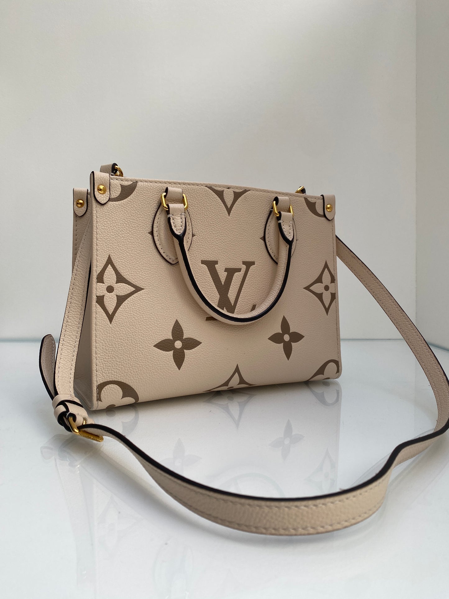 Louis Vuitton Cream On The Go PM Bag