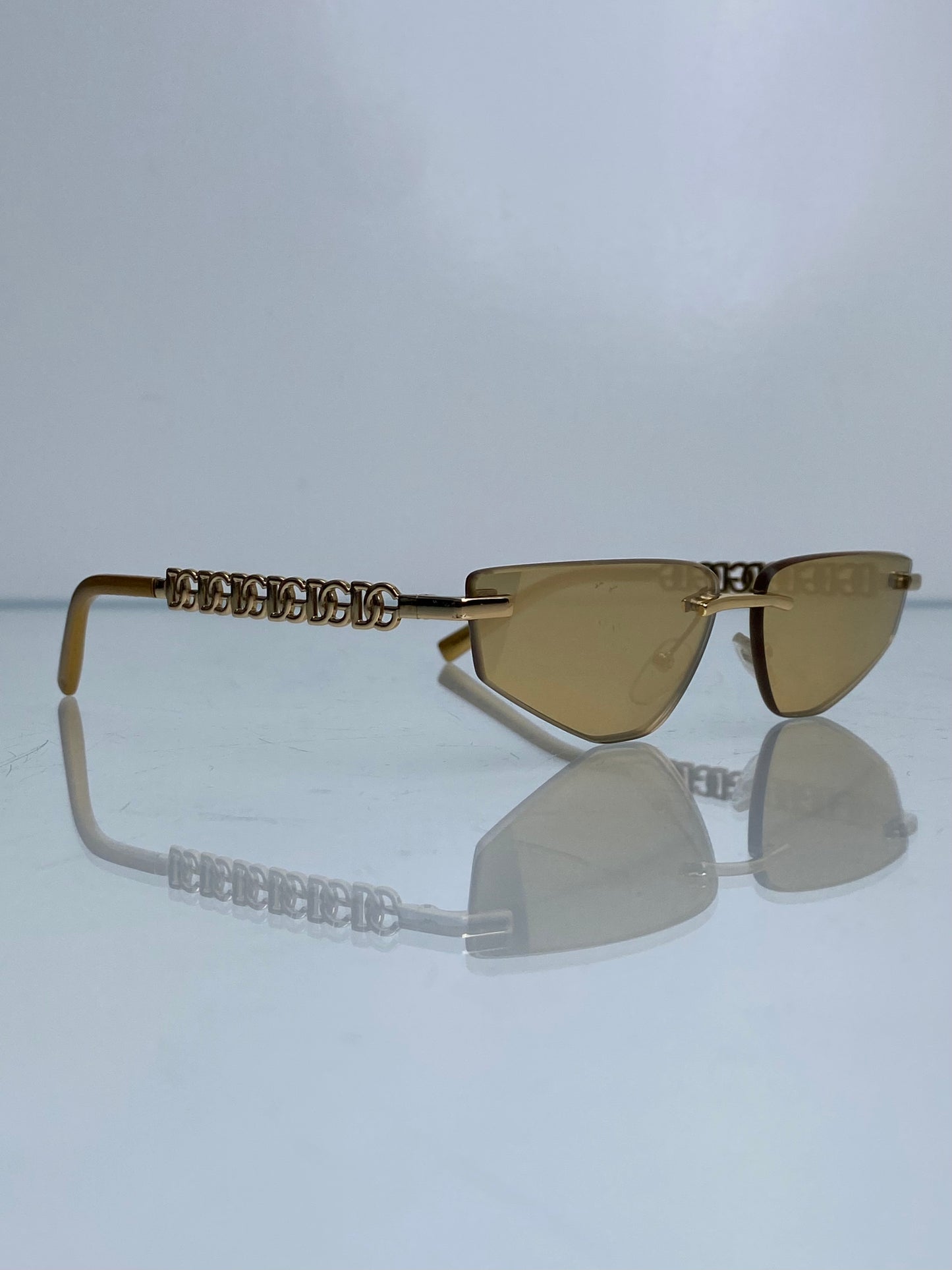 Dolce & Gabbana Gold Logo Frameless Sunglasses