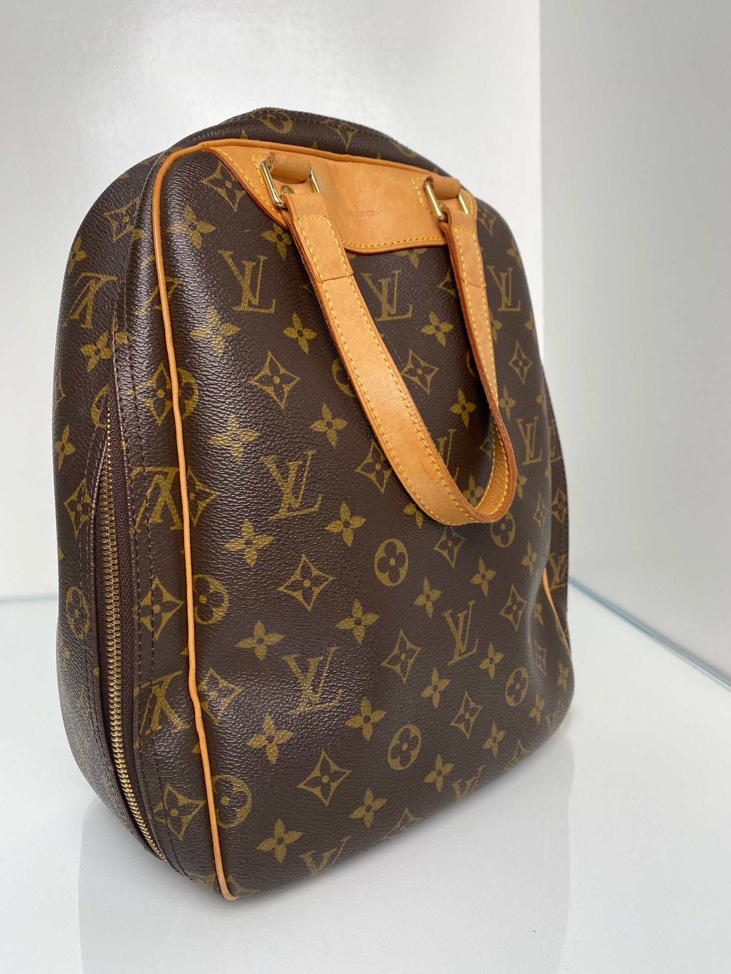 Louis Vuitton Monogram Excursion Top Handle Bag