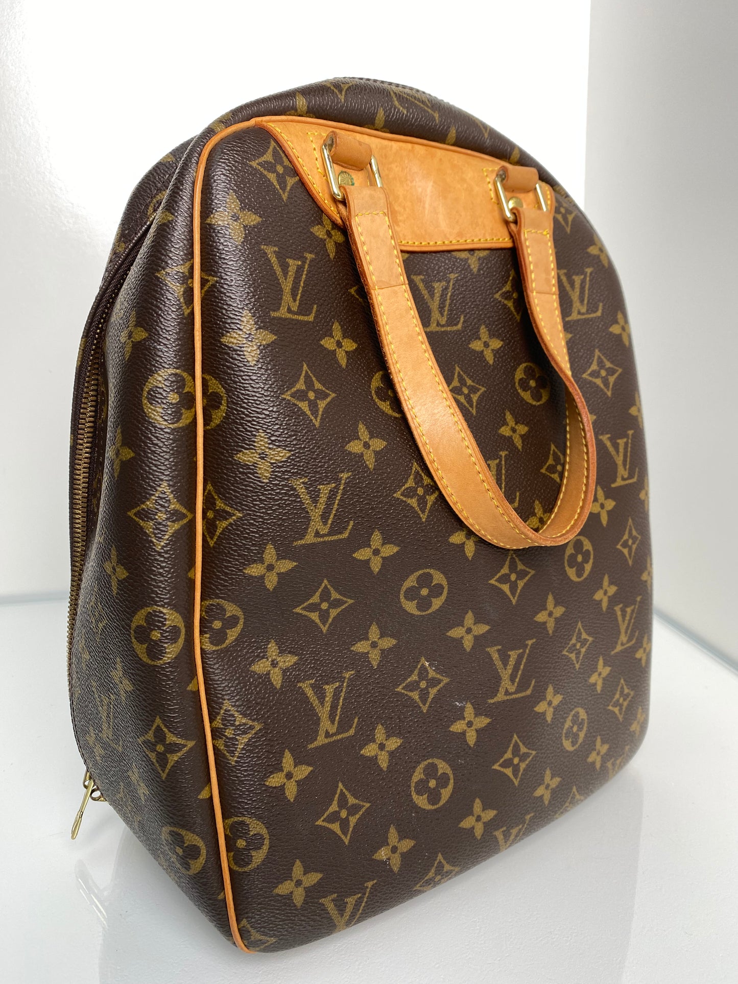 Louis Vuitton Monogram Excursion Top Handle Bag