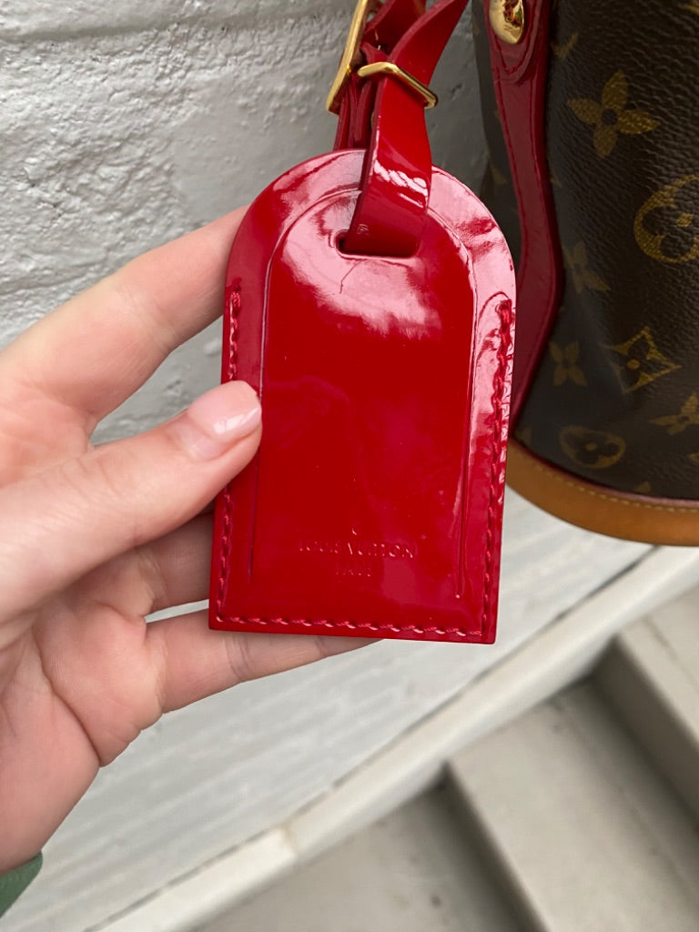 Small red best sale louis vuitton bag