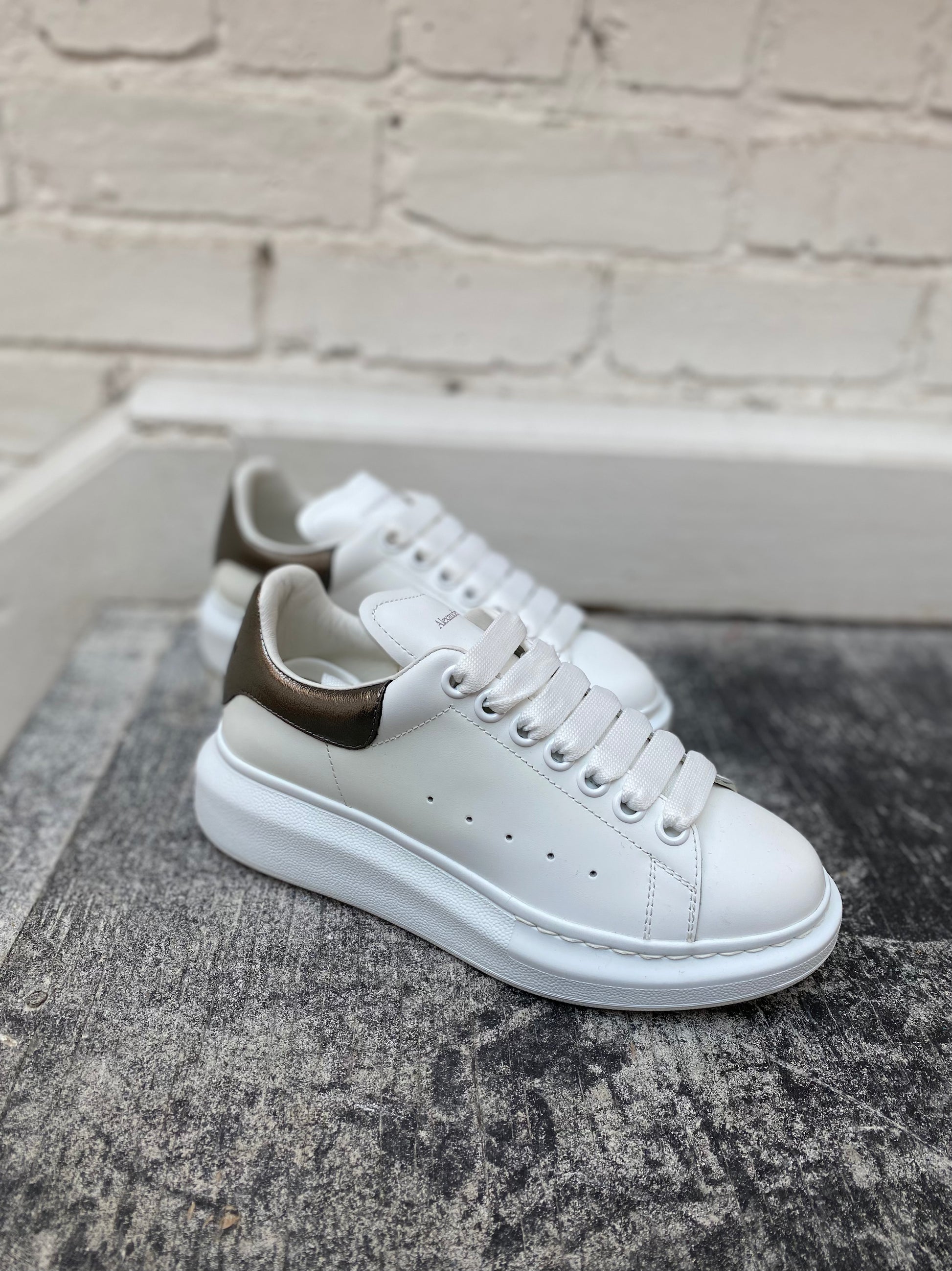 Alexander McQueen white sneakers Edwards Worm Farm