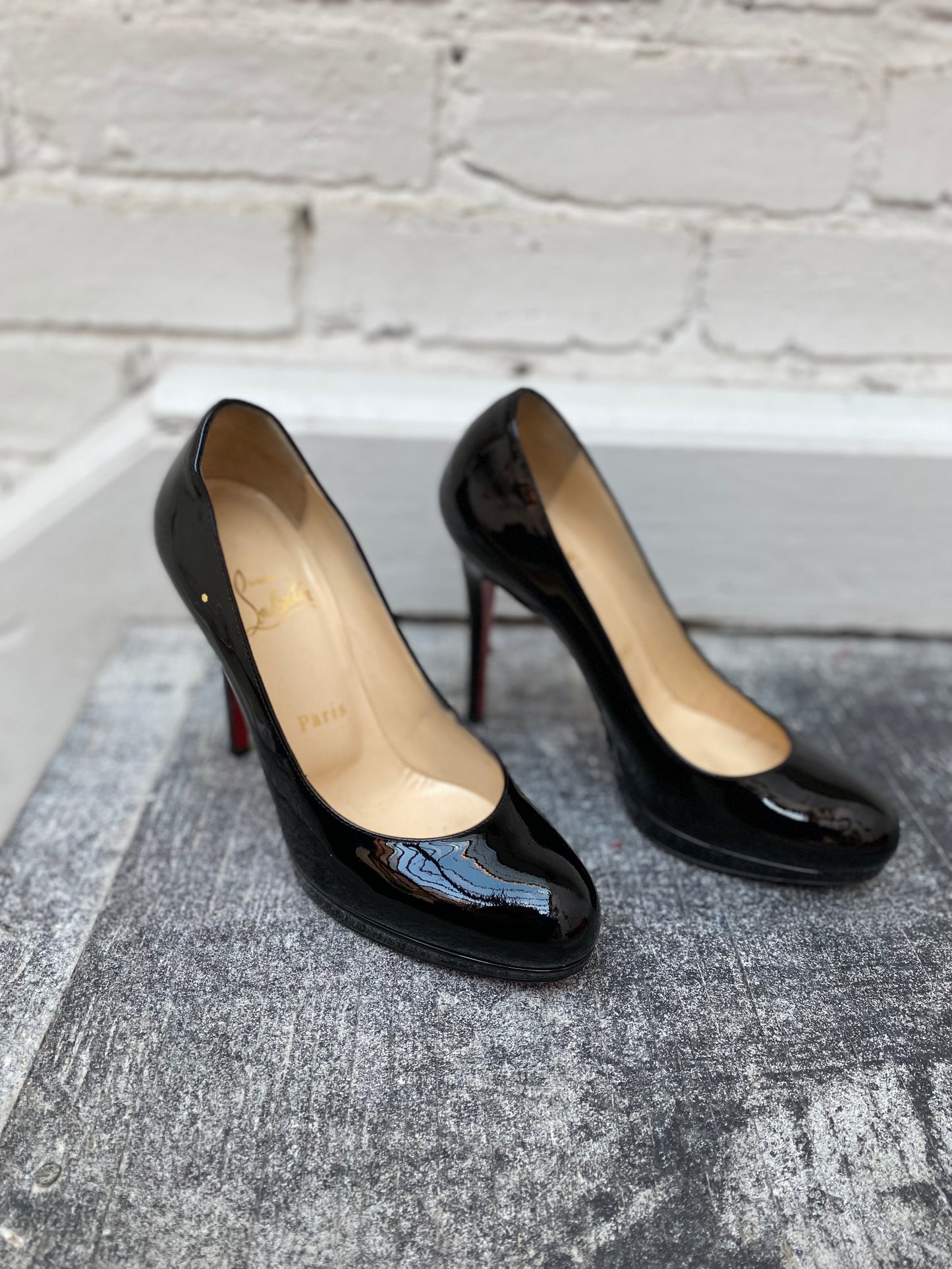 Christian Louboutin black patent leather heel