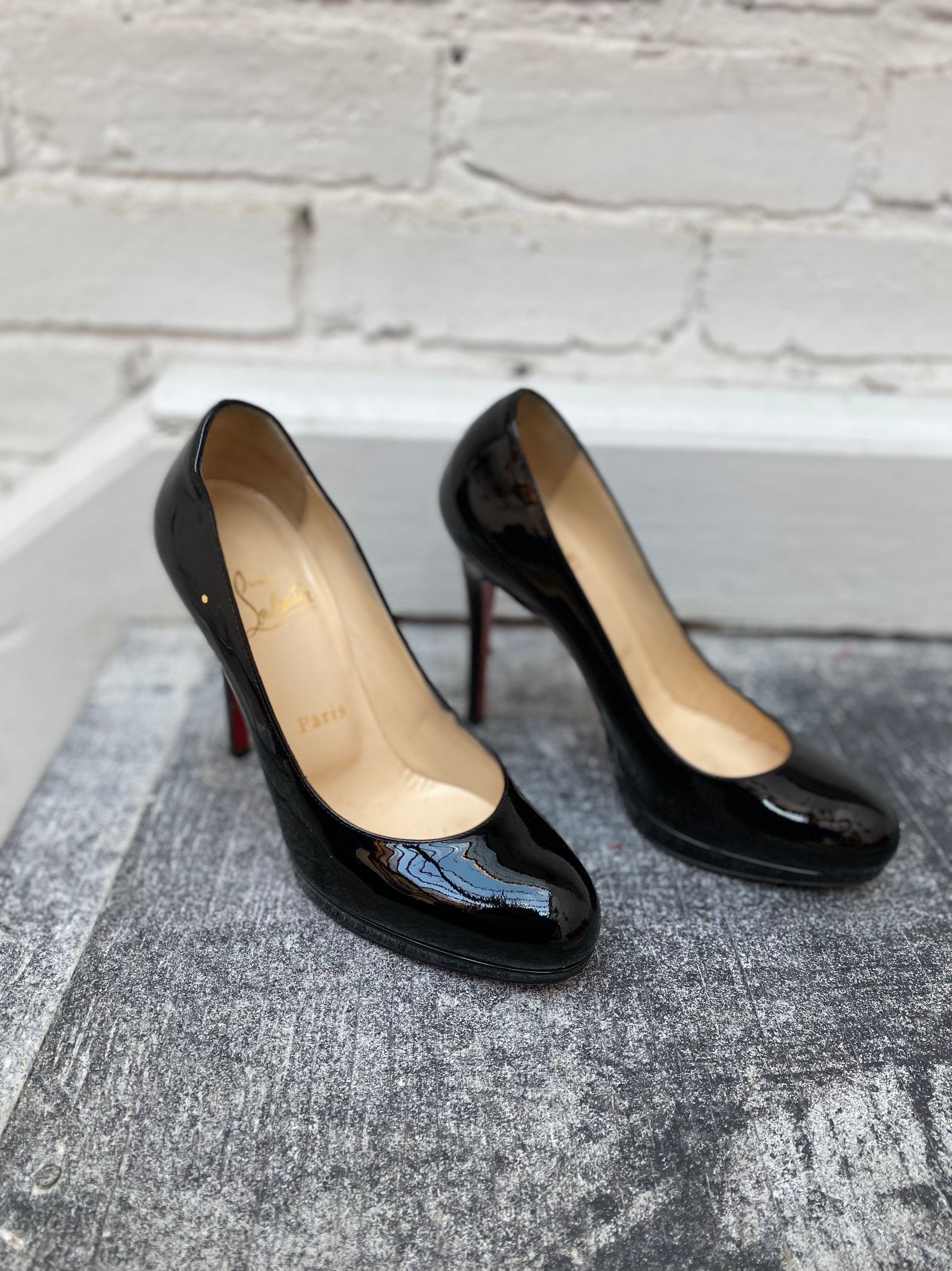 Christian Louboutin black patent leather heel Edwards Worm Farm